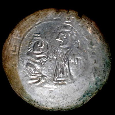 Brakteat pokutny Bolesława Krzywoustego
św. Wojciech błogosławi klęczącego księcia.
