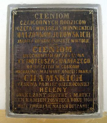 Tablica pamiątkowa wewnątrz kościoła pw. Św. Jana Chrzciciela
