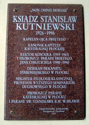 Tablica pamiątkowa wewnątrz kościoła pw. Św. Jana Chrzciciela
