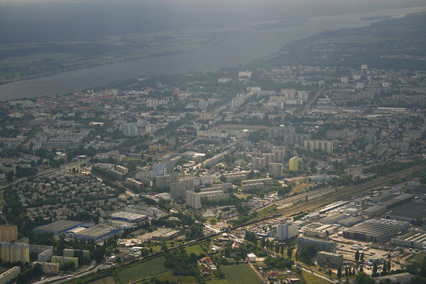 Z blaskiem
Część Płocka w promieniach słońca
Słowa kluczowe: Płoc promienie
